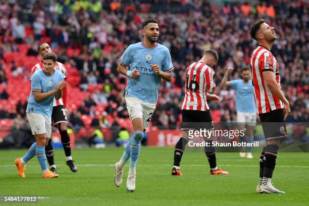 Riyad Mahrez of Manchester City celebrates after scoring the team's third goal and their hat-trick during the FA Cup Semi Final match between...