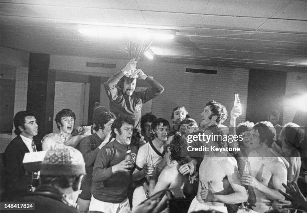 The Glasgow Rangers football team celebrate in their dressing room after winning the European Cup Winners' Cup final against FC Dynamo Moscow at Camp...