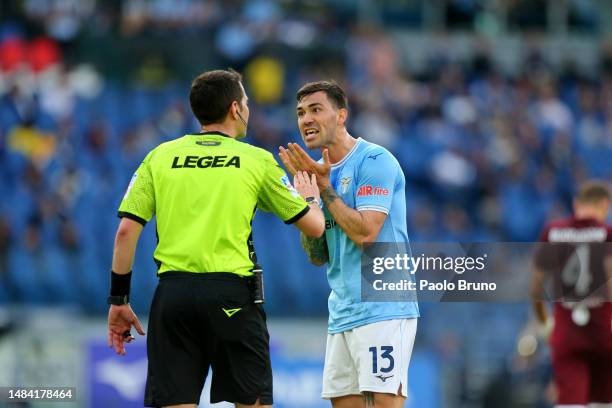 Alessio Romagnoli of SS Lazio reacts against the referee Davide Ghersini during the Serie A match between SS Lazio and Torino FC at Stadio Olimpico...