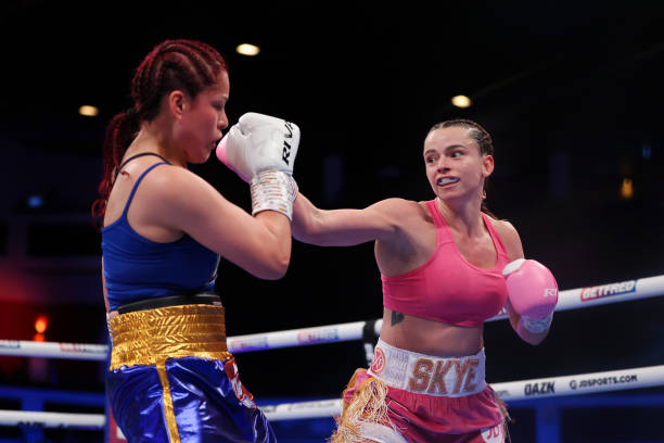 Skye Nicolson punches Linda Laura during the Super Featherweight fight between Skye Nicolson and Linda Laura Lecca at Motorpoint Arena Cardiff on...