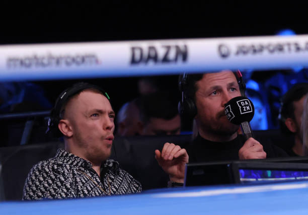 Commentator Sonny Edwards and Darren Barker reacts during Skye Nicholson and Linda Laura Lecca in action during their featherweight bout at the...