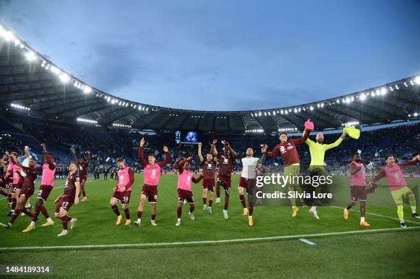 Torino FC players celebrates the victory at the end of the Serie A match between SS Lazio and Torino FC at Stadio Olimpico on April 22, 2023 in Rome,...