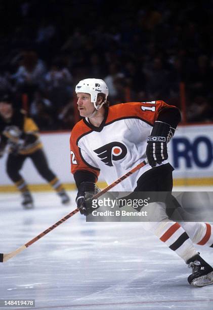 Tim Kerr of the Philadelphia Flyers skates on the ice during an NHL game against the Pittsburgh Penguins on March 22, 1990 at the Spectrum in...
