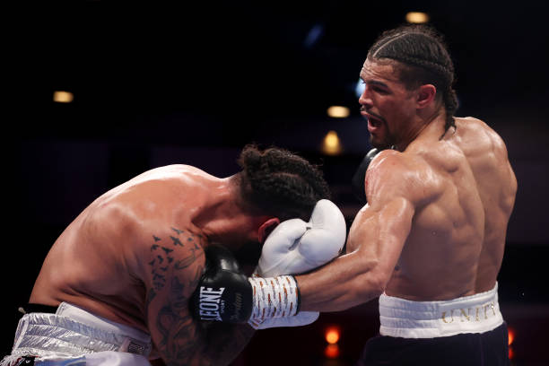 Jordan Thompson punches Luke Watkins during the Cruiserweight fight between Jordan Thompson and Luke Watkins at Motorpoint Arena Cardiff on April 22,...