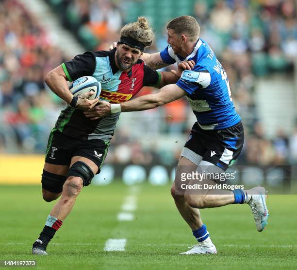 Luke Wallace of Harlequins holds off Ruaridh McConnochie during the Gallagher Premiership Rugby match between Harlequins and Bath Rugby at Twickenham...