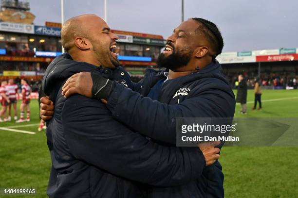 Tom O'Flaherty of Sale Sharks celebrates with Simon McIntyre of Sale Sharks following the Gallagher Premiership Rugby match between Gloucester Rugby...