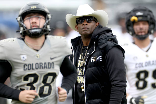 Head coach Deion Sanders of the Colorado Buffaloes watches as his team warms up prior to their spring game at Folsom Field on April 22, 2023 in...