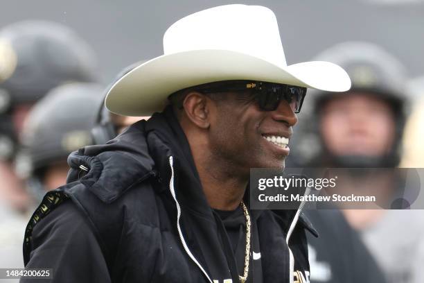 Head coach Deion Sanders of the Colorado Buffaloes watches as his team warms up prior to their spring game at Folsom Field on April 22, 2023 in...