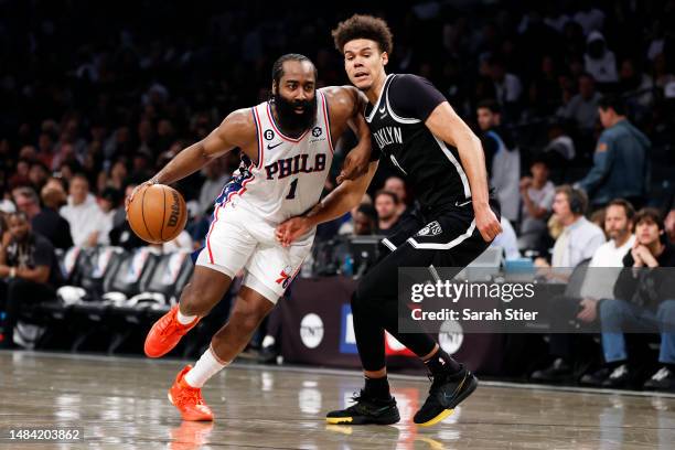 James Harden of the Philadelphia 76ers dribbles against Cameron Johnson of the Brooklyn Nets during the second half of Game Four of the Eastern...