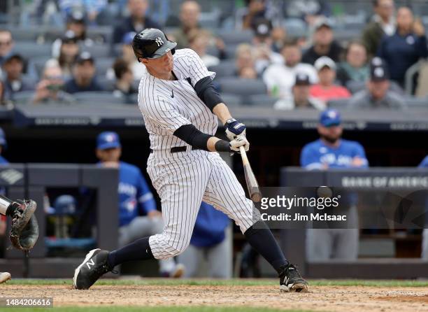 LeMahieu of the New York Yankees connects on his ninth-inning, walk-off single against the Toronto Blue Jays at Yankee Stadium on April 22, 2023 in...