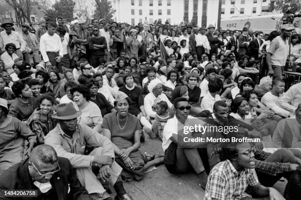 Marchers await speeches at the conclusion of the Selma to Montgomery Civil Rights March on March 25, 1965 in Montgomery, Alabama.