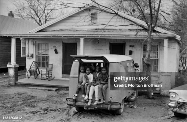 Four children watch as marchers arrive on the outskirts of downtown Montgomery at the conclusion of the Selma to Montgomery Civil Rights March on...