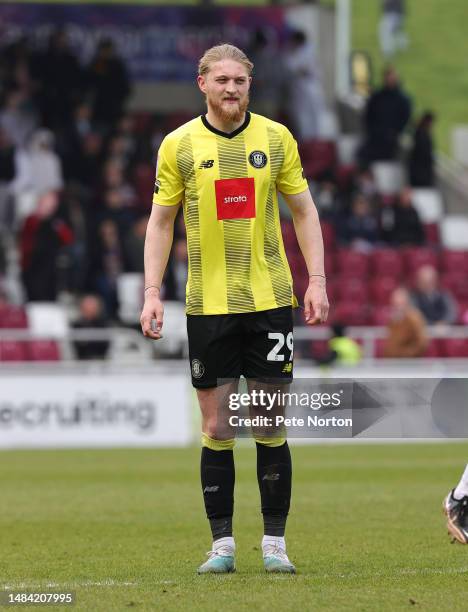 Luke Armstrong of Harrogate Town in action during the Sky Bet League Two between Northampton Town and Harrogate Town at Sixfields on April 22, 2023...