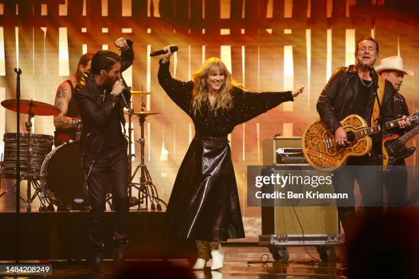 German band The BossHoss together with Ilse DeLange perform on stage during the Giovanni Zarrella show at Studio Berlin Adlershof on April 22, 2023...