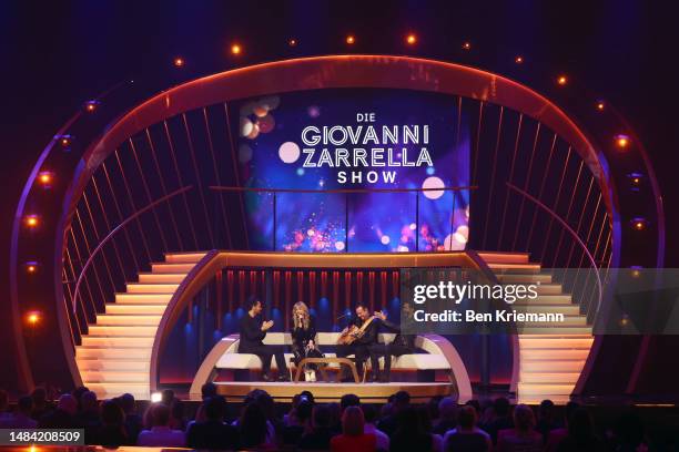 Giovanni Zarrella, Ilse DeLange, and Sascha Vollmer and Alec Völkel from the band BossHoss speak on stage during the Giovanni Zarrella show at Studio...