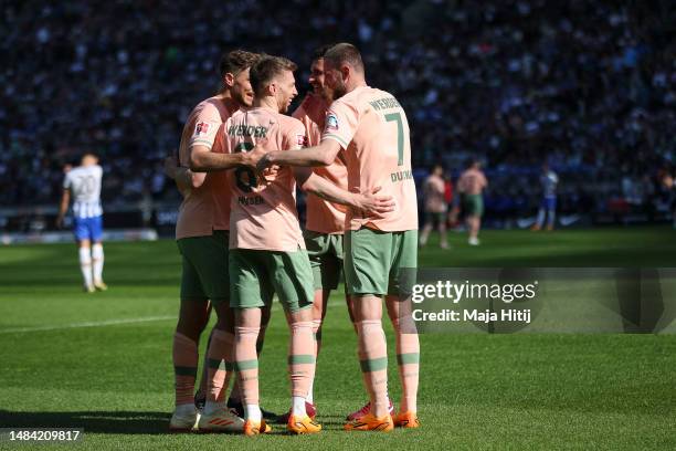 Mitchell Weiser of SV Werder Bremen celebrates after scoring the team's fourth goal during the Bundesliga match between Hertha BSC and SV Werder...