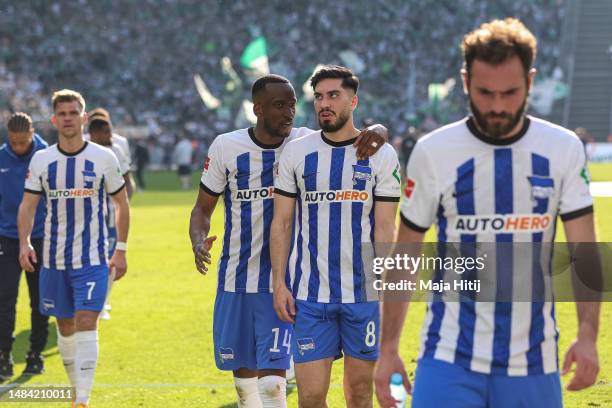 Dodi Lukebakio, Suat Serdar and Lucas Tousart of Hertha BSC react after the Bundesliga match between Hertha BSC and SV Werder Bremen at...