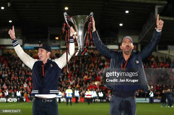 Rob McElhenney and Ryan Reynolds, Owners of Wrexham celebrate with the Vanarama National League trophy as Wrexham win the Vanarama National League...