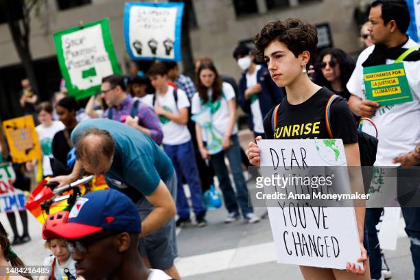People listen during an Earth Day gathering titled “End the Era of Fossil Fuels,” at Freedom Plaza on April 22, 2023 in Washington, DC. Activists...