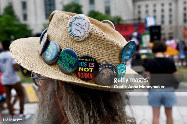 People attend an Earth Day gathering titled “End the Era of Fossil Fuels,” at Freedom Plaza on April 22, 2023 in Washington, DC. Activists with...