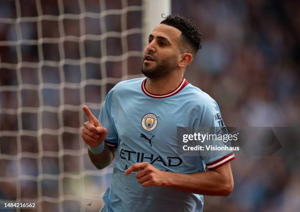 Riyad Mahrez of Manchester City celebrates scoring his second goal of three goals during the FA Cup Semi Final match between Manchester City and...