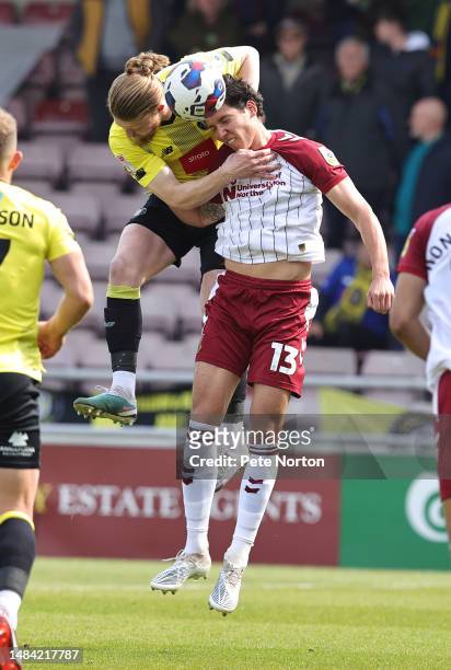 Luke Armstrong of Harrogate Town contests the ball with David Norman Jr of Northampton Town during the Sky Bet League Two between Northampton Town...