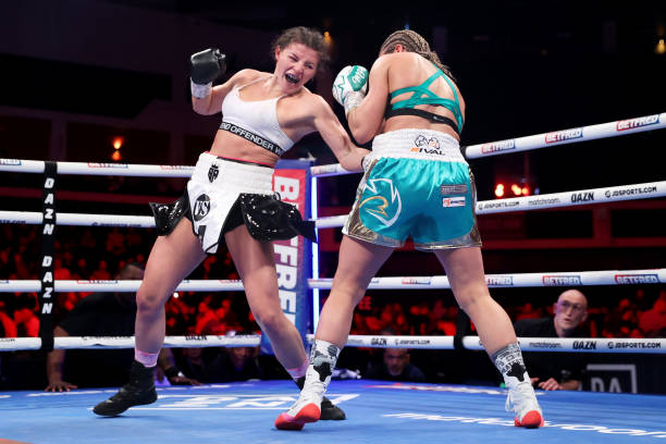 Sandy Ryan punches Marie Pier Houle during the WBO Welterweight World Title Fight fight between Sandy Ryan and Marie Pier Houle at Motorpoint Arena...