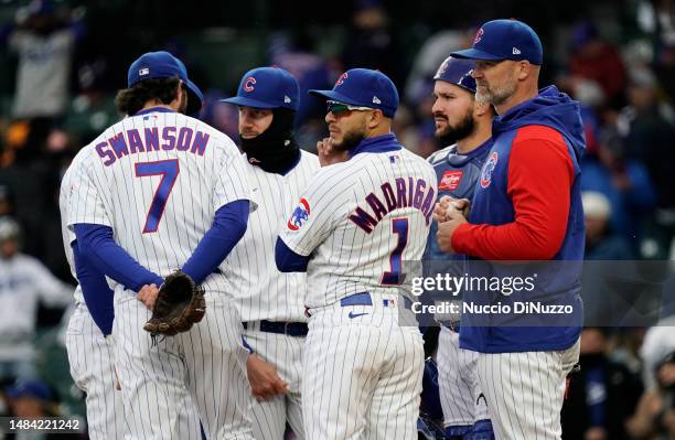 Manager David Ross of the Chicago Cubs visits the mound for a pitching change during the ninth inning of the game against the Los Angeles Dodgers at...