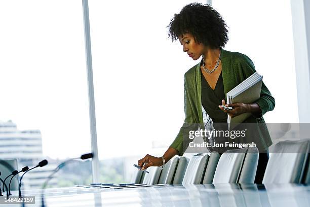 secretary preparing board room - secretary stock pictures, royalty-free photos & images