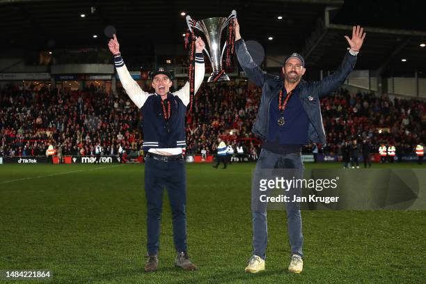 Rob McElhenney and Ryan Reynolds, Owners of Wrexham celebrate with the Vanarama National League trophy as Wrexham win the Vanarama National League...