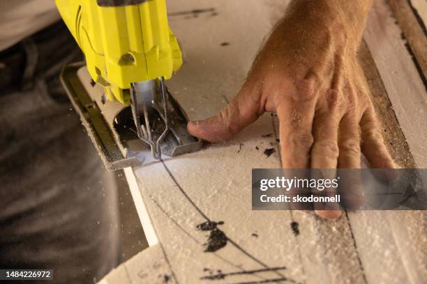 surfboard shaper - sawing stock pictures, royalty-free photos & images