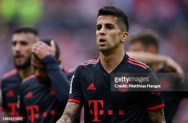 Joao Cancelo of FC Bayern Munich looks dejected following the team's defeat during the Bundesliga match between 1. FSV Mainz 05 and FC Bayern München...