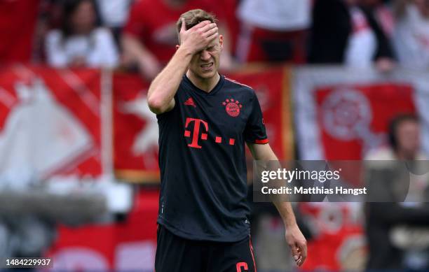 Joshua Kimmich of Bayern Munich shows his disappointment during the Bundesliga match between 1. FSV Mainz 05 and FC Bayern München at MEWA Arena on...