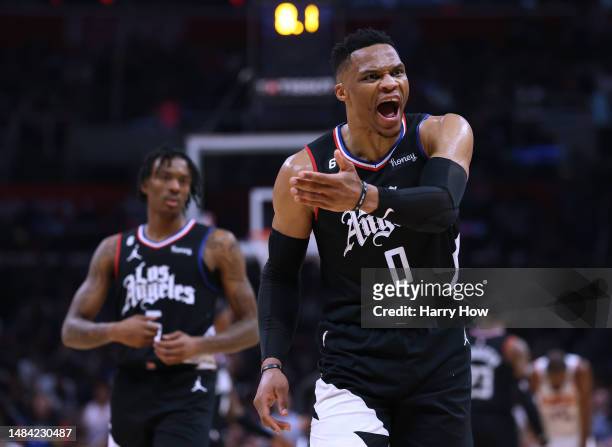 Russell Westbrook of the LA Clippers argues a foul call in front of Bones Hyland during a 112-100 loss to the Phoenix Suns during Game Four of the...
