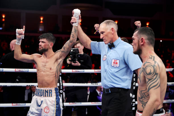 Joe Cordina celebrates as the Referee awards them the victory after defeating Shavkatdzhon Rakimov during the IBF Super Flyweight World Title fight...