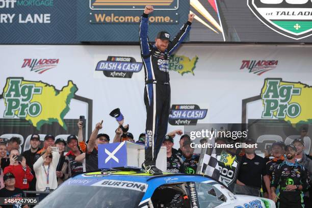 Jeb Burton, driver of the Solid Rock Carriers Chevrolet, celebrates in victory lane after winning the NASCAR Xfinity Series Ag-Pro 300 at Talladega...