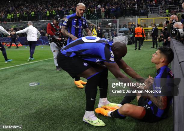 Joaquin Correa of FC Internazionale celebrates with team mates after scoring to give the side a 3-1 lead during the UEFA Champions League...