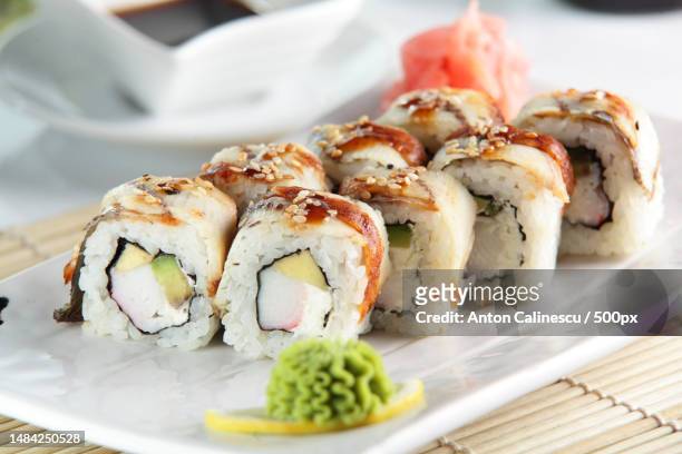 close-up of sushi served in plate on table,romania - wasabi stock pictures, royalty-free photos & images