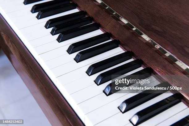 high angle view of piano keys - ebony wood stock pictures, royalty-free photos & images