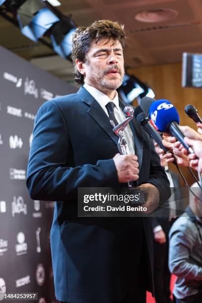 Benicio del Toro holds the Honorific Award during the Platino Awards for Ibero-American Cinema 2023 at IFEMA Palacio Municipal on April 22, 2023 in...