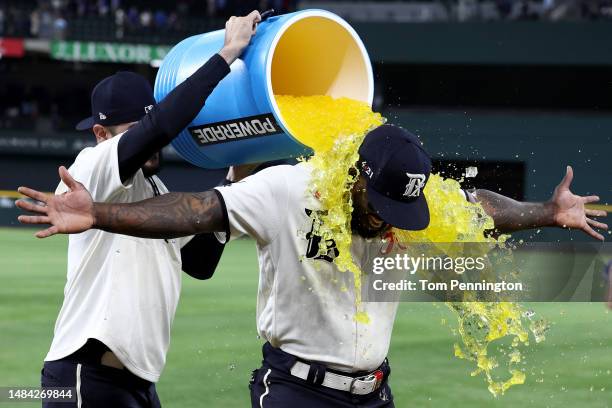 Adolis Garcia of the Texas Rangers is doused with Poweraid after hitting three home run and 8 RBI's against the Oakland Athletics in an 18-3 wi at...