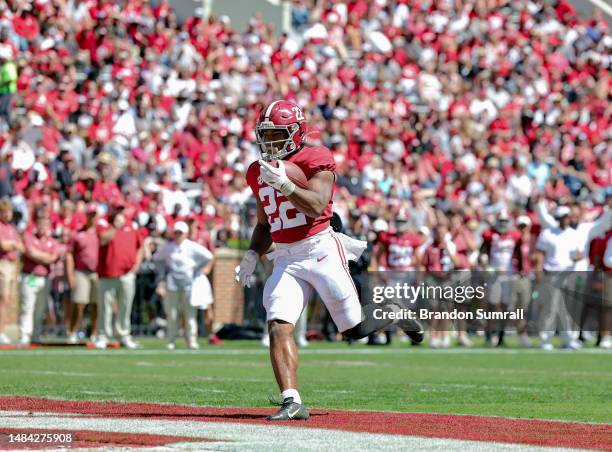 Justice Haynes of the Crimson Team runs for a Touchdown during the second half of the Alabama Spring Football Game at Bryant-Denny Stadium on April...