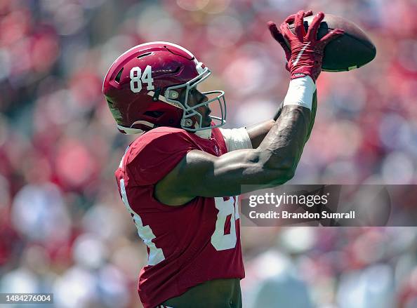 Amari Niblack of the Crimson Team hauls in a pass during warm ups