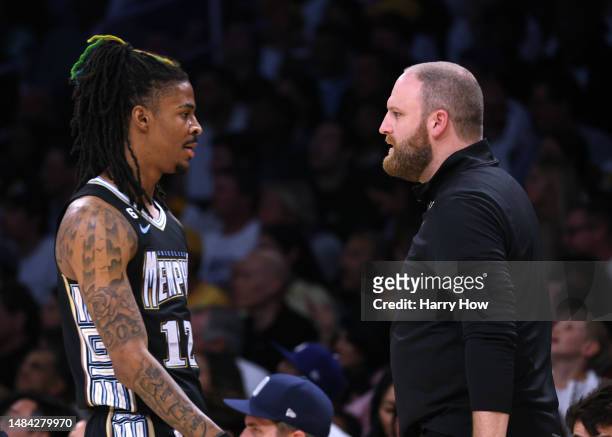 Head coach Taylor Jenkins of the Memphis Grizzlies talks with Ja Morant during the first quarter against the Los Angeles Lakers in Game Three of the...