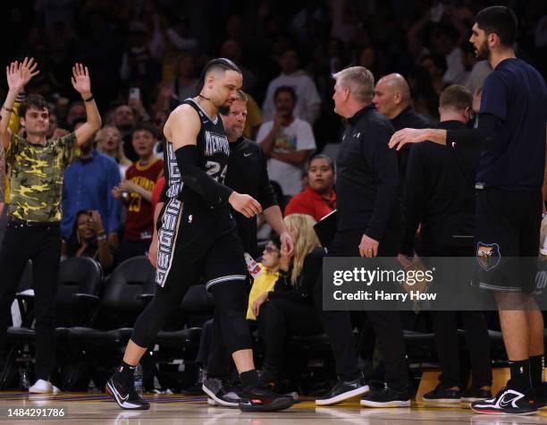 Dillon Brooks of the Memphis Grizzlies leaves the court as he is ejected from the game for a flagrant foul two on LeBron James of the Los Angeles...
