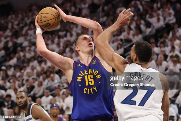 Nikola Jokic of the Denver Nuggets takes a second half shot over Rudy Gobert of the Minnesota Timberwolves during Game Three of the Western...