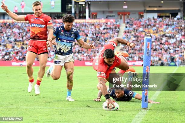 Robert Jennings of the Dolphins scores a try during the round eight NRL match between the Dolphins and Gold Coast Titans at Suncorp Stadium on April...