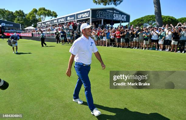 Chase Koepka of the Smash walks to the green after his hole in one at the 12th during day three of Liv Golf Adelaide at The Grange Golf Course on...