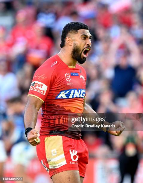 Robert Jennings of the Dolphins celebrates victory after the round eight NRL match between the Dolphins and Gold Coast Titans at Suncorp Stadium on...