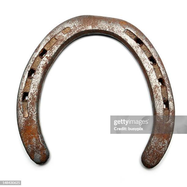 lucky horseshoe isolated on white - hoefijzer stockfoto's en -beelden